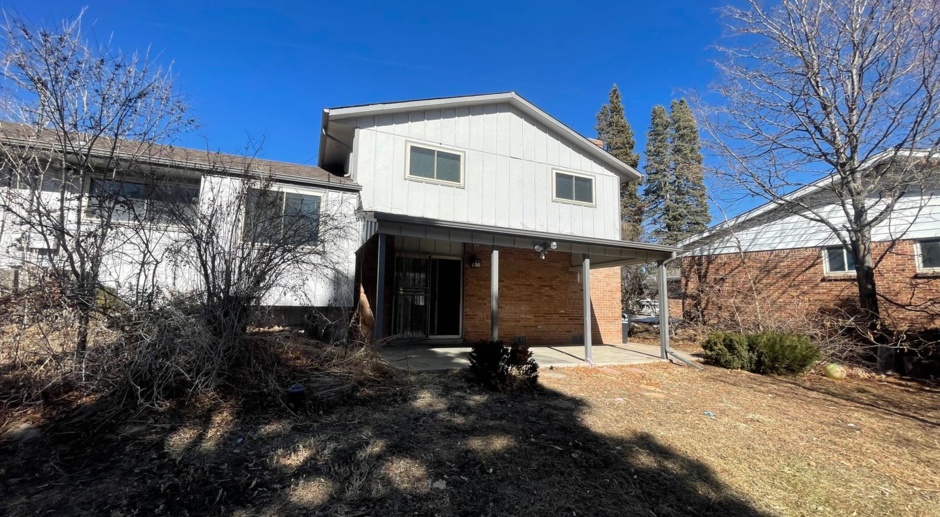 $0 DEPOSIT OPTION. CAPTIVATING TRI-LEVEL HOME WITH 4 BEDROOMS AND 3 BATHS IN AURORA