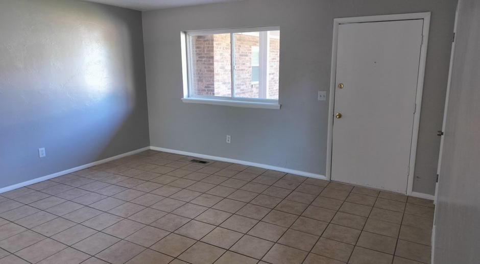 2 bedroom, 1 bathroom apartment with granite countertops next to UCO campus
