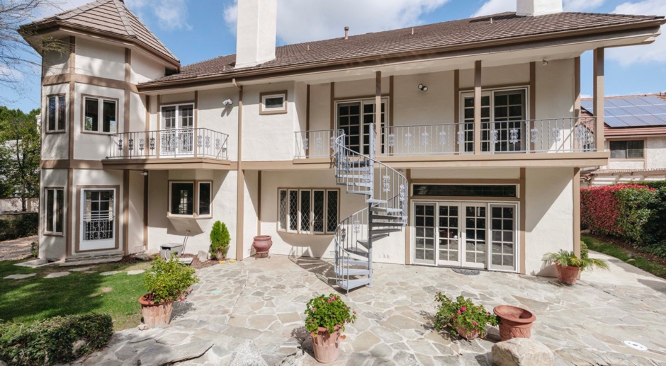 Incredible 5 Bedrooms, 8 Bathrooms Estate in Gated Community, South of Ventura Blvd.
