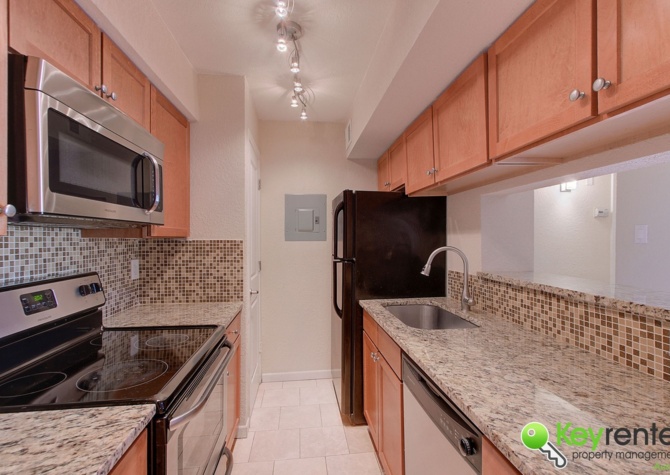 Apartments Near Embrace Elegance: Discover Your Luxurious Haven in this 2-Bed, 1-Bath Gated Condo Oasis with Balcony Bliss and Culinary Delight in Austin, TX!