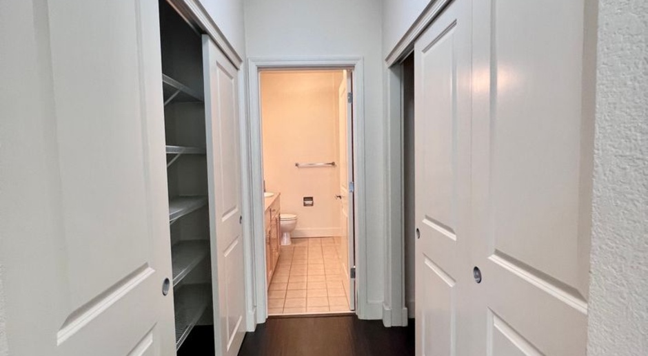 Modern and stylish 2/2.5 townhome w/ washer & dryer and 2 parking spots included!