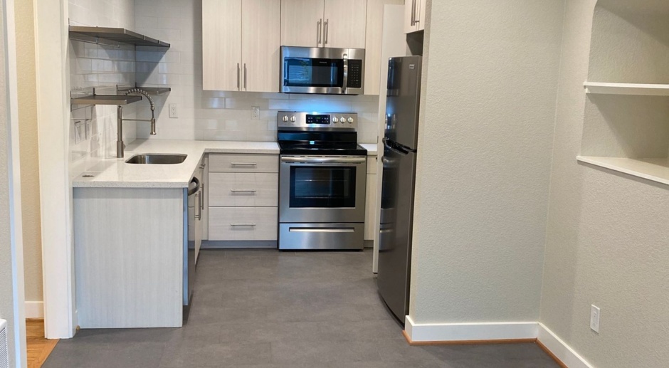 New Modern Remodel Hot Alberta Arts Spacious 1250 sf 1 BR Full Basement Green Space New Stainless Steel Appliances Quartz Subway Tile Full WD DW Pets ok Free street parking