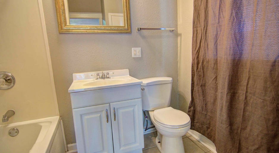 Large charming 3 bedroom 2 bath with oversized master bedroom that has its own private bath!