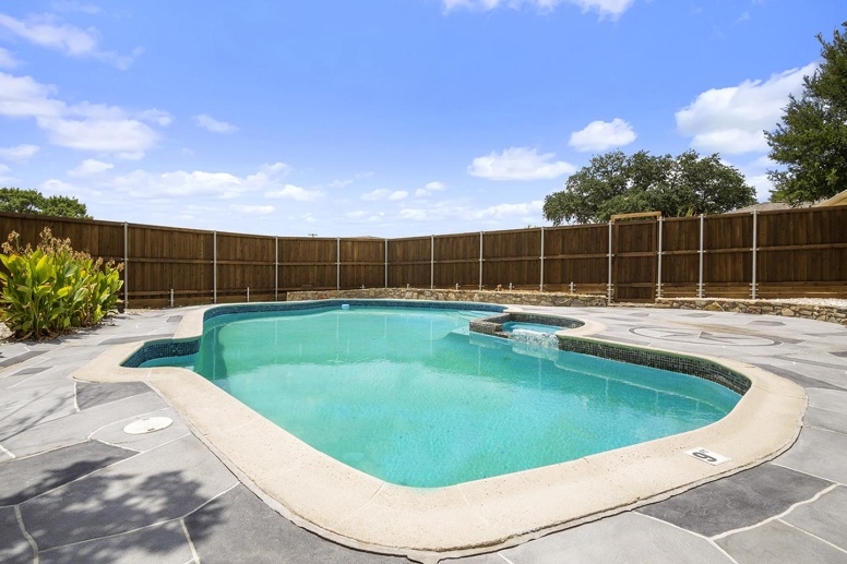 Lavishly remodeled Plano home with fenced yard & pool