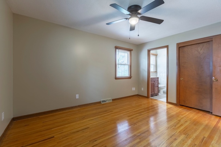Large home with updated light fixtures, ceiling fans, new flooring and lawncare included!
