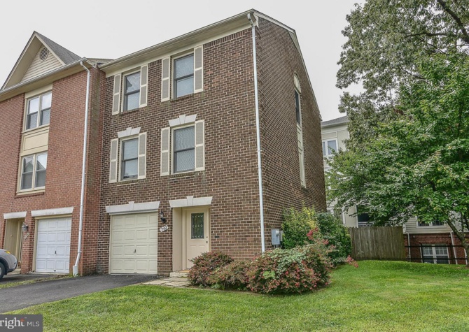 Houses Near Rarely Available 3-Level End Unit Townhome With Garage in Arlington!