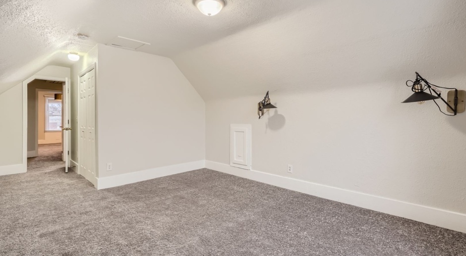 LOCATION! Blocks to Bronco's Stadium, light rail, park, Sloan's Lake.  ALL Utilities Included! Oversized  2 car garage w/workspace & outside RV PARKING!