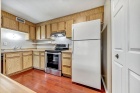 Tranquil Two-Bedroom Condo: Park Setting, Prime Location, Modern Comforts!